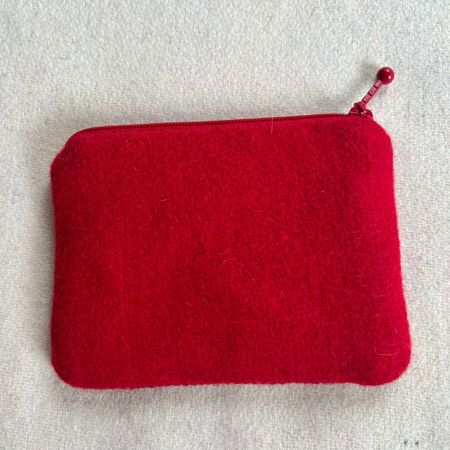 Broderi & sykit, liten börs ”tunnelsyn, ankomst” 10x13cm