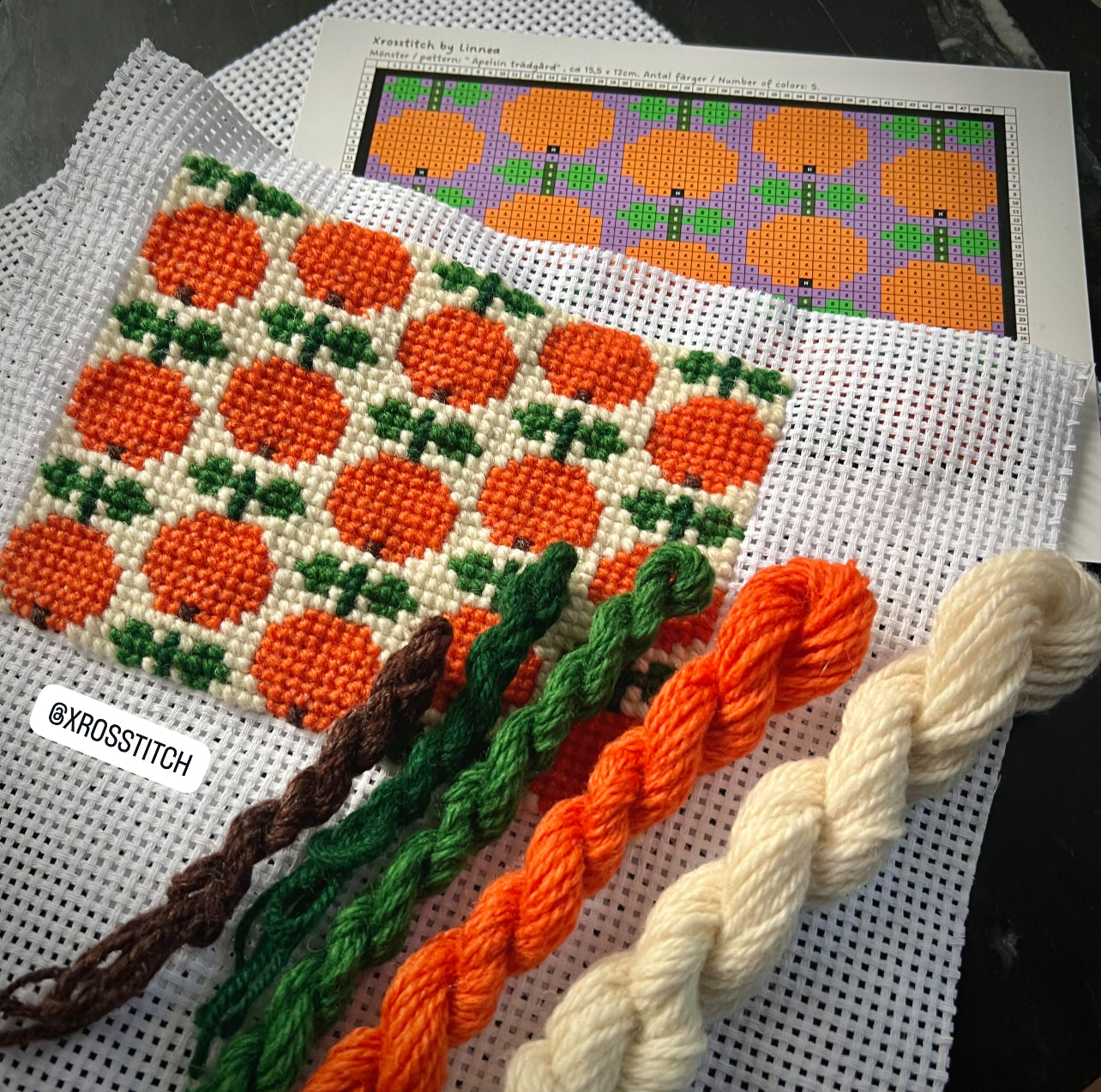 Broderi med ullgarn apelsinträdgård