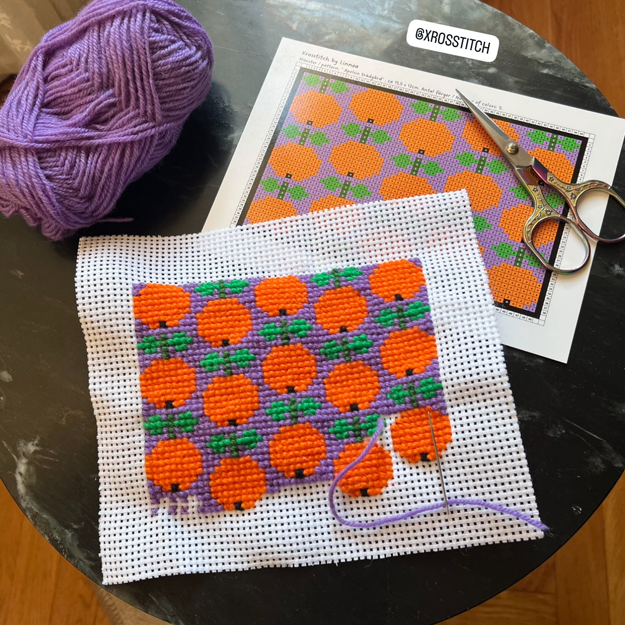 Broderi med ullgarn apelsinträdgård