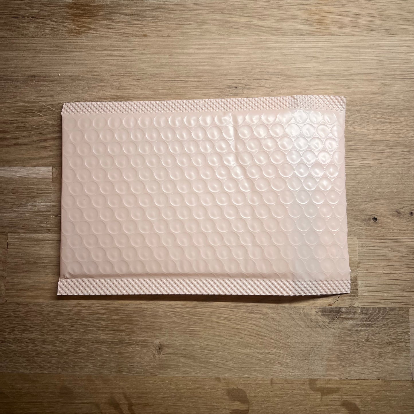 Bubbelkuvert ljus blekrosa 10x15cm